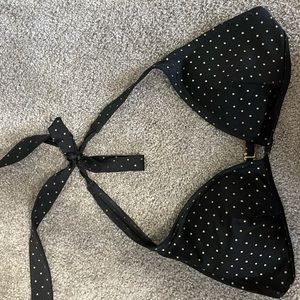 Simple black bikini top with gold polka dots